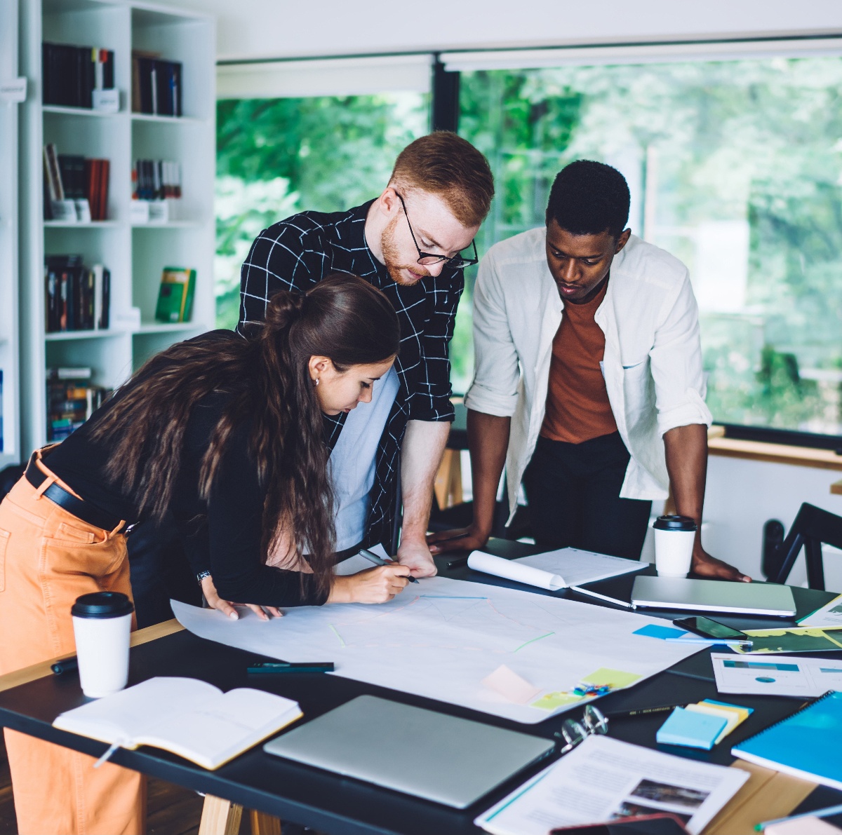 Team of 3 people establishing a data strategy blueprint